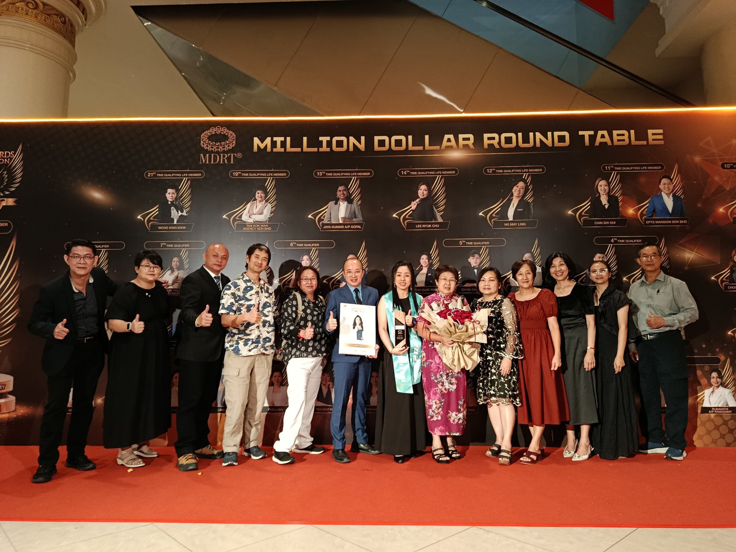 Staff members and agent gathering at Milion Dollar Round Table event